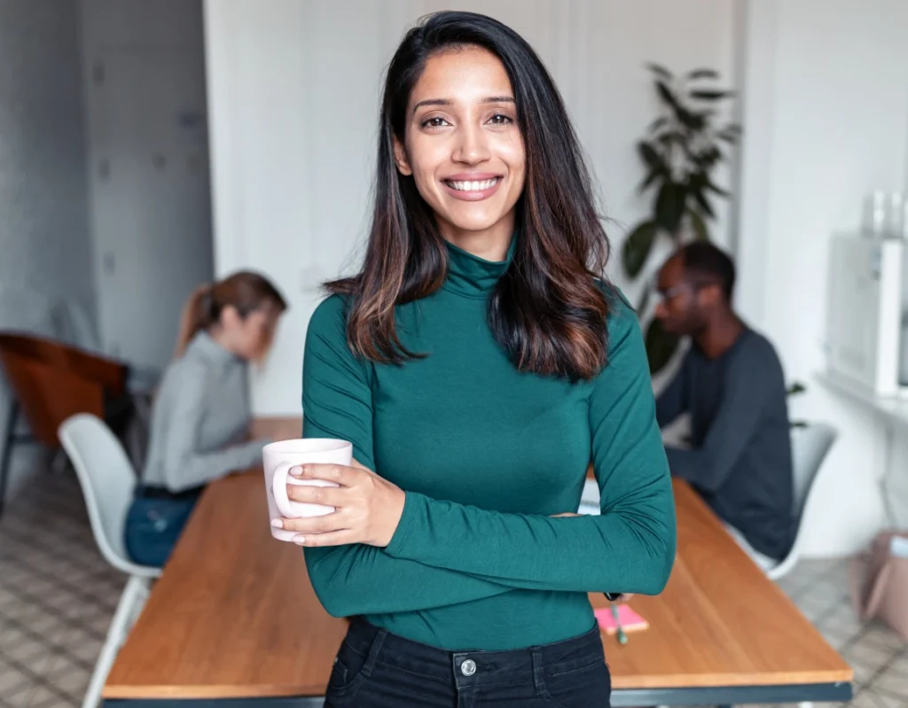 Business professional smiling while discussing on-demand IT recruitment in Brampton.