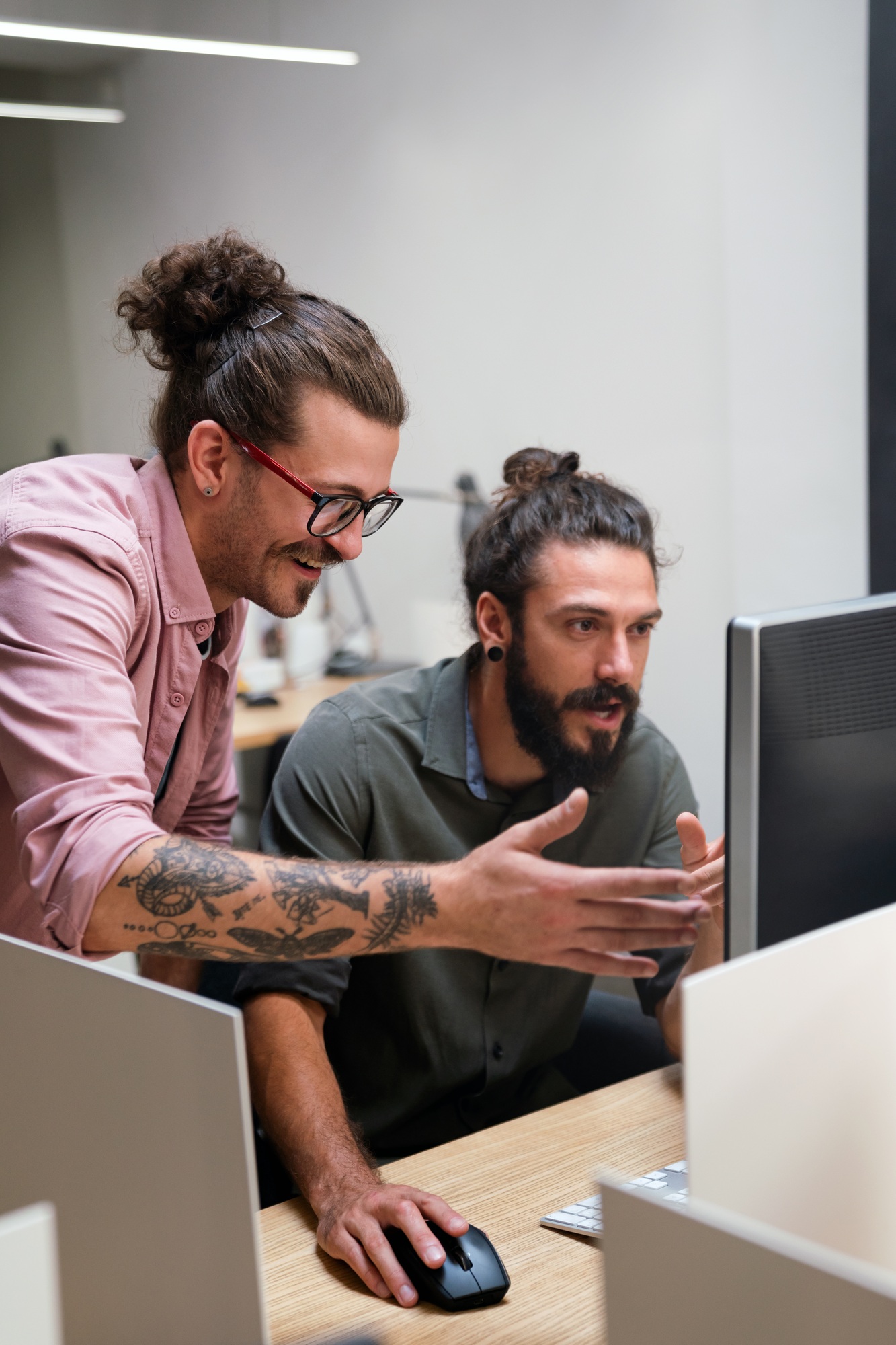 We hire software engineers like these team members who are working on a project for an IT programming company.