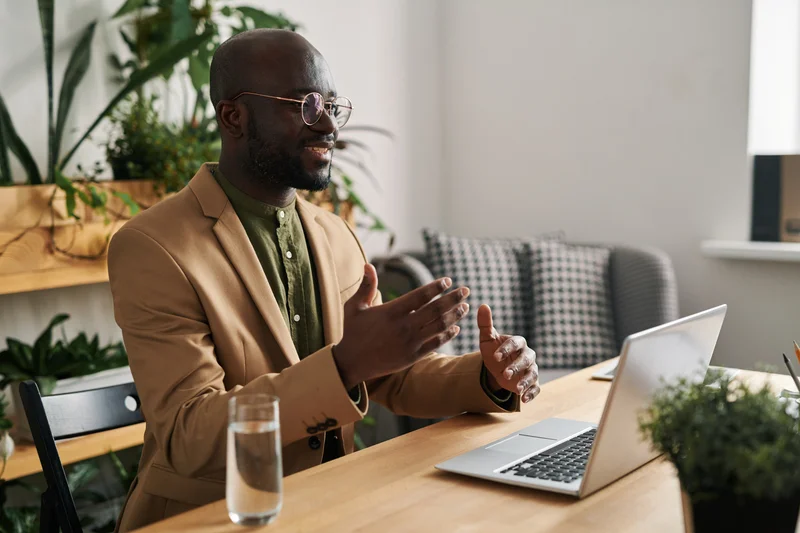 Candidate presenting compliance knowledge and workflow documentation in a virtual interview, part of a structured hiring evaluation.